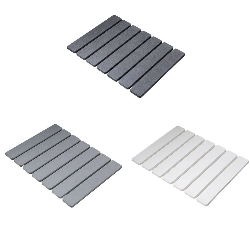 Three foldable diatomite dish drying mats in charcoal, gray, and white