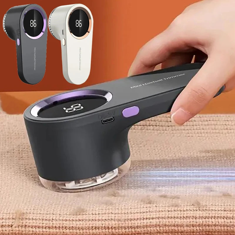 Black and white digital fabric shavers shown with hand-held use on sweater